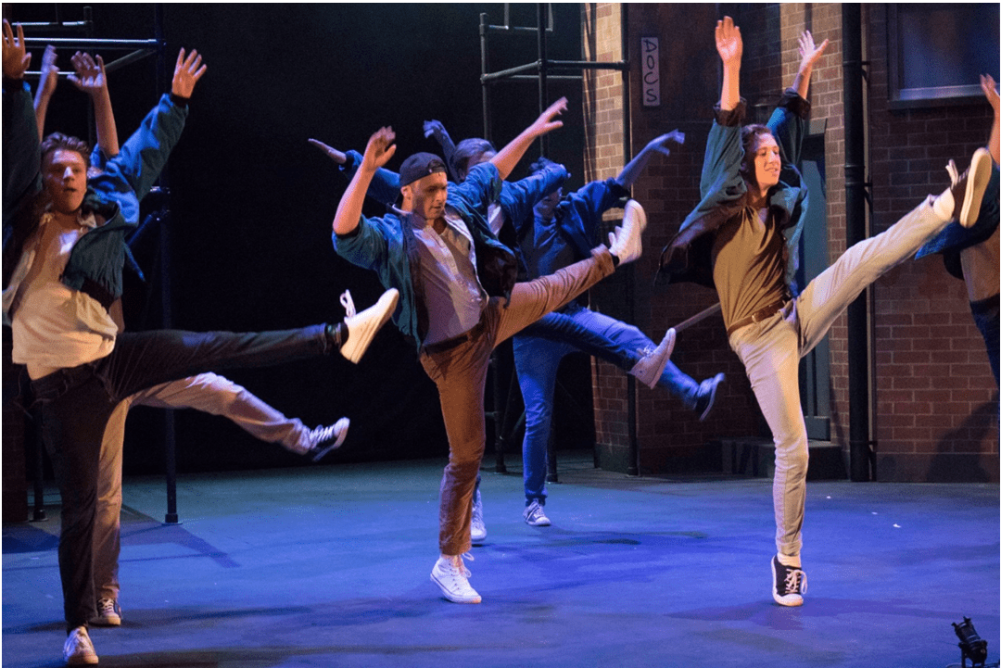 West Side Story male dancers on stage
