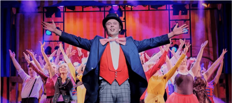 P T Barnum on stage taking the applause