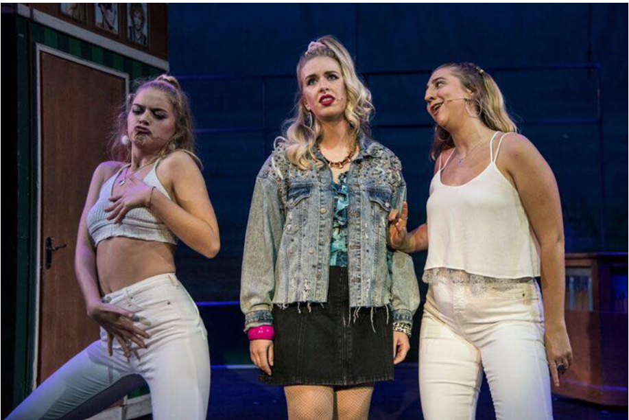 Legally Blonde performers on stage
